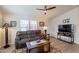 Comfortable living room with plush seating, modern decor, and windows for natural light at 40569 N Wedge Dr, San Tan Valley, AZ 85140