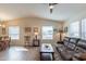 Inviting living room features vaulted ceiling, comfortable seating, with lots of light at 40569 N Wedge Dr, San Tan Valley, AZ 85140