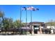 Exterior view of the Anthem Community Center with American and Arizona state flags displayed at 42209 N 46Th Ln, Phoenix, AZ 85086