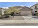 Charming single-Gathering home with a well-maintained front yard and a two-car garage at 42209 N 46Th Ln, Phoenix, AZ 85086