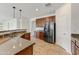 Modern kitchen with granite countertops, stainless steel appliances, and ample cabinet space at 42209 N 46Th Ln, Phoenix, AZ 85086