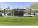 Community park view showcasing the Anthem pickleball courts with shaded seating areas at 42209 N 46Th Ln, Phoenix, AZ 85086