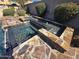 This backyard features a luxurious spa with rock accents, and water features at 42209 N 46Th Ln, Phoenix, AZ 85086