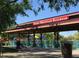 Daisy Mountain Railroad station with playground in background; a charming community attraction at 44610 N Sonoran Arroyo Ln, New River, AZ 85087