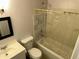 Bathroom with a shower-tub, vanity, and updated fixtures at 4650 E Wood St, Phoenix, AZ 85040