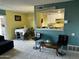Open-concept living space with an open view into the kitchen and chandelier lighting at 4650 E Wood St, Phoenix, AZ 85040