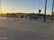 An outdoor playground including swing set, slide, and other features at 4650 E Wood St, Phoenix, AZ 85040