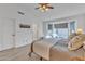 Serene main bedroom with a bay window and a neutral color palette at 557 S Dodge St, Gilbert, AZ 85233