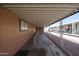 Convenient covered parking with direct access to the home's entrance and adjacent units at 652 S Ellsworth Rd # 92, Mesa, AZ 85208