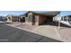 Inviting single-story home with neutral paint, covered parking, and low-maintenance landscaping at 652 S Ellsworth Rd # 92, Mesa, AZ 85208