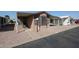 Charming single-story home featuring covered parking, neutral paint, and low maintenance landscaping at 652 S Ellsworth Rd # 92, Mesa, AZ 85208