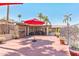 Inviting pool area with shaded seating, dining tables, and lush landscaping for outdoor enjoyment at 652 S Ellsworth Rd # 92, Mesa, AZ 85208