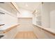 Walk-in closet featuring custom shelving and ample storage space at 750 S Cholla St, Gilbert, AZ 85233