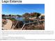 Picturesque view of the Lago Estancia community featuring a lake and walking paths at 750 S Cholla St, Gilbert, AZ 85233