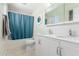 Bright bathroom featuring double sinks, a shower-tub combo, and tile flooring at 796 E Pepper Dr, Casa Grande, AZ 85122