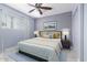 Bedroom featuring neutral tones, a ceiling fan, and a window with natural light at 796 E Pepper Dr, Casa Grande, AZ 85122