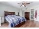 Spacious main bedroom featuring an ensuite bathroom and a wooden dresser at 796 E Pepper Dr, Casa Grande, AZ 85122