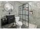Stylish bathroom with a black vessel sink and vanity, plus a walk-in shower at 8540 N 104Th Ave, Peoria, AZ 85345
