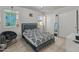 This bedroom features tile floors, white walls, and a comfortable bed at 8540 N 104Th Ave, Peoria, AZ 85345