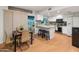 Cozy kitchen featuring an island with stool seating at 8540 N 104Th Ave, Peoria, AZ 85345