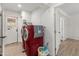 This laundry room features a red washer and dryer set at 8540 N 104Th Ave, Peoria, AZ 85345