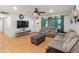Comfortable living room featuring cozy seating and a ceiling fan at 8540 N 104Th Ave, Peoria, AZ 85345