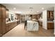 Spacious kitchen with a large marble island, stainless steel appliances, and ample cabinet space at 9900 N 52Nd St, Paradise Valley, AZ 85253