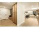 View of the mudroom featuring built-in storage and a bench connected to the kitchen and living room at 9900 N 52Nd St, Paradise Valley, AZ 85253