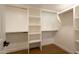 Walk-in closet features built in shelves, drawers and hanging rods at 9900 N 52Nd St, Paradise Valley, AZ 85253