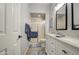 Bathroom includes double sinks with granite counters, a shower, and gray tile floors at 1021 S Greenfield Rd # 1178, Mesa, AZ 85206