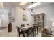Tastefully decorated dining area with chandelier, dark wood table, and comfortable seating at 1021 S Greenfield Rd # 1178, Mesa, AZ 85206