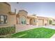 Beautiful home features a well-kept lawn, two-car garage, and a cozy seating area at 1021 S Greenfield Rd # 1178, Mesa, AZ 85206