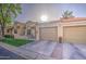 Attractive home boasts a cozy patio area, an attached garage, and a nicely kept lawn at 1021 S Greenfield Rd # 1178, Mesa, AZ 85206
