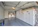 Spacious garage with ample storage cabinets and a convenient laundry area at 1021 S Greenfield Rd # 1178, Mesa, AZ 85206