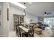 Open-concept dining and living area featuring a skylight and comfortable, stylish furnishings at 1021 S Greenfield Rd # 1178, Mesa, AZ 85206