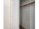 View inside a closet with a shelf and wooden rod for hanging clothes at 11318 S Hopi Dr, Goodyear, AZ 85338