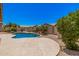 Backyard featuring a private pool and a patio perfect for entertaining or enjoying the outdoors at 11318 S Hopi Dr, Goodyear, AZ 85338