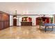 Spacious finished basement with a wet bar and a recreational area at 11988 E Larkspur Dr, Scottsdale, AZ 85259