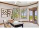 Bright office space with elegant trim work, scenic views, and a stylish desk at 11988 E Larkspur Dr, Scottsdale, AZ 85259