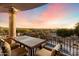 Outdoor patio dining area with beautiful views of the surrounding landscape at 11988 E Larkspur Dr, Scottsdale, AZ 85259