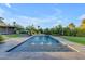 Beautiful in-ground pool surrounded by lush landscaping and stone patio at 12034 N 61St St, Scottsdale, AZ 85254