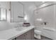 Well-lit bathroom featuring sleek vanity, chrome fixtures, and modern shower, providing a functional and stylish space at 12034 N 61St St, Scottsdale, AZ 85254