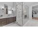 Modern bathroom featuring a glass-enclosed shower, updated fixtures, and ample counter space at 12034 N 61St St, Scottsdale, AZ 85254