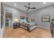 Cozy bedroom with hardwood floors, modern fixtures, and closet space, creating a comfortable retreat at 12034 N 61St St, Scottsdale, AZ 85254