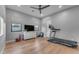 Bright exercise room with hardwood floors, natural light, and modern equipment for a healthy lifestyle at 12034 N 61St St, Scottsdale, AZ 85254