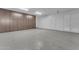 Spacious garage with epoxy flooring and custom storage cabinets, perfect for organization and vehicle protection at 12034 N 61St St, Scottsdale, AZ 85254