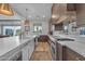 Well-appointed kitchen features modern appliances, custom cabinetry, and a bright, airy atmosphere at 12034 N 61St St, Scottsdale, AZ 85254