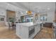 Spacious kitchen featuring a large island, modern appliances, and seamless flow to the living spaces at 12034 N 61St St, Scottsdale, AZ 85254