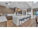 Modern kitchen with a large center island, stainless steel appliances, and sleek cabinetry at 12034 N 61St St, Scottsdale, AZ 85254