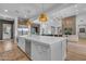 Open floor plan boasts a spacious kitchen and living area, perfect for entertaining at 12034 N 61St St, Scottsdale, AZ 85254